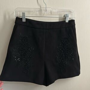 Embroidered beaded suede shorts